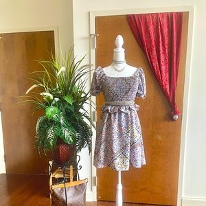 Multi-colored luxe farmhouse dress with sweetheart neckline.